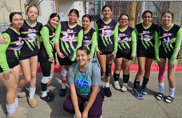 Raptors Select players together at a volleyball event
